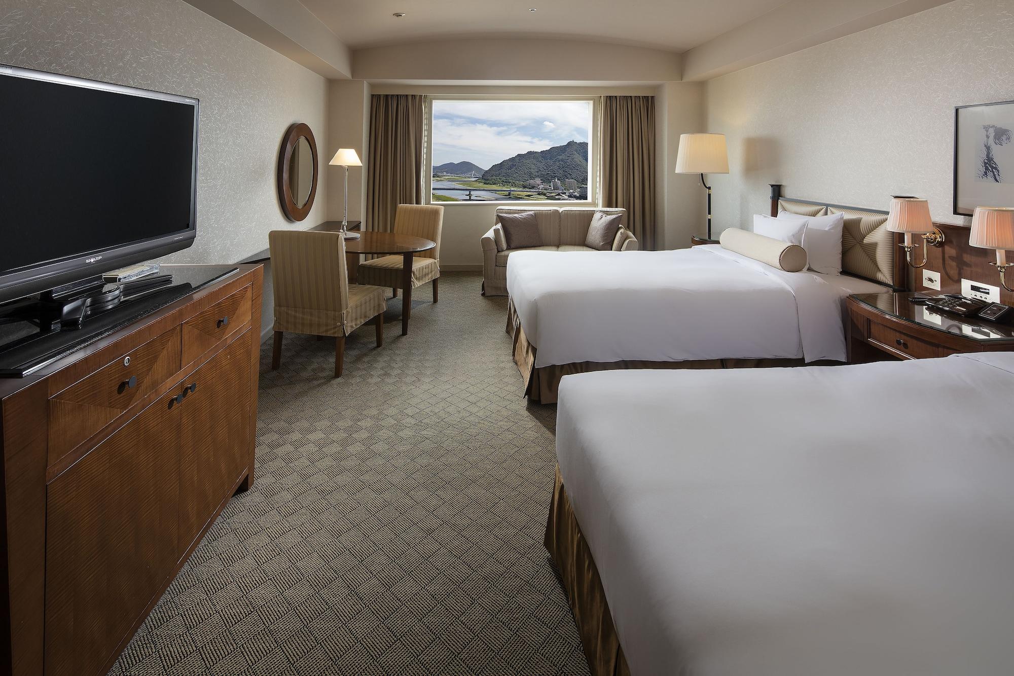 Miyako Hotel Gifu Nagaragawa Exteriör bild A guest room at the Hilton San Francisco